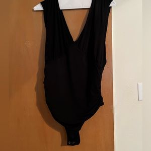 Express women’s body contour bodysuit. Size Large